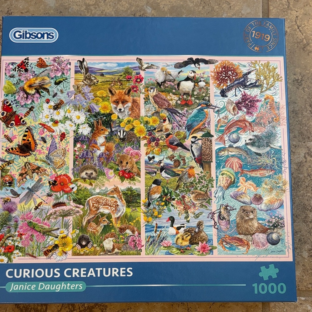 NWT Gibsons 1000 Piece Puzzle, Curious Creatures. Sealed in box.